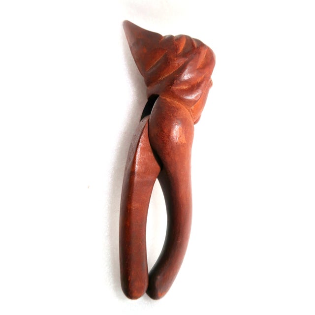 Antique Bavarian very well-carved nutcracker, with peasant's head in a pointed workingman's hat. The photos do not do...