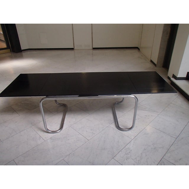 Table tops are in good condition, some of the chrome has patina.