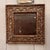18th century Baroque mirror with a deeply carved frame of scrolling foliage between gadrooned borders, its painted and...