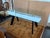 Design Plus Galley presents the Chronos Dining Room Table by Guisi Mastro for Roche Bobois. The table has a tempered glass...