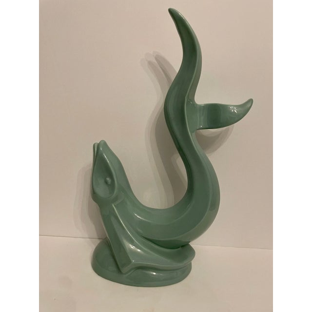 Vintage Haeger Aqua green colored ceramic Flying Fish Statue, depicted here as if the fish is getting ready to rush to the...