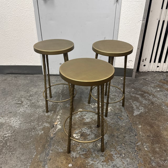 Design Plus Gallery presents a set of three Westwood Counter Stools from Four Hands. Each stool is constructed from iron...