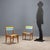 Pair of small beech chairs with colored Formica inserts. Good condition. This piece is attributed to the mentioned...