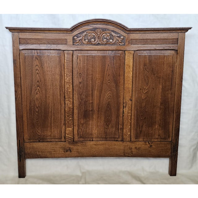Infuse your bedroom with the quiet grandeur of early 20th‑century France. This French 1920s solid oak bed frame showcases...