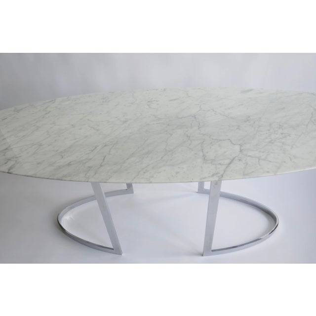 An elegant oval shaped versatile console table which can easily become a desk and/or a small dining table Chrome rounded...