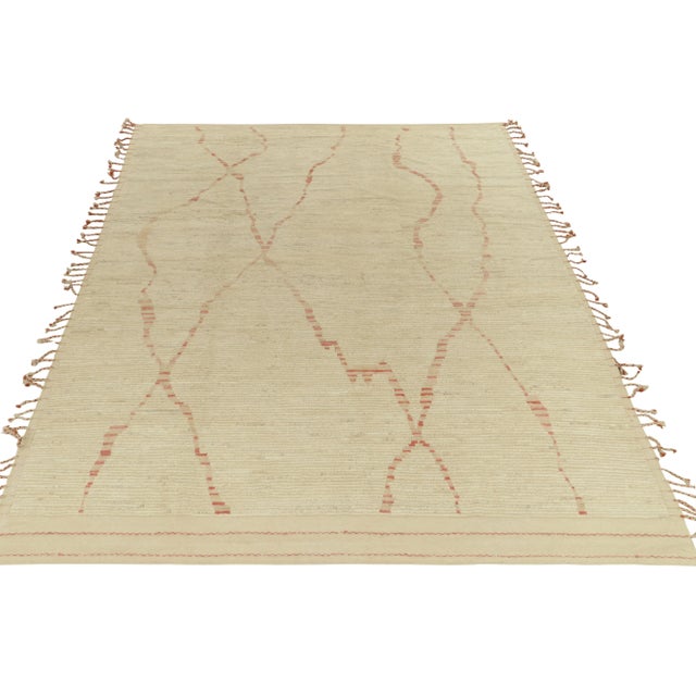 Rug & Kilim boasts its contemporary take on Moroccan style with this cozy 9x12 rendering. Hand-knotted in fine wool for a...