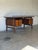 This freestanding executive desk features a floating top supported by an elegant leg structure with dual drawer pedestals....