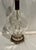 A vintage cut crystal table lamp on a bronze tone base in the style of Waterford crystal. This well made lamp is quite...