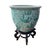 A marvelous pair of Chinese export famille vert porcelain fish bowl planters / jardinières featuring intricate, hand-...