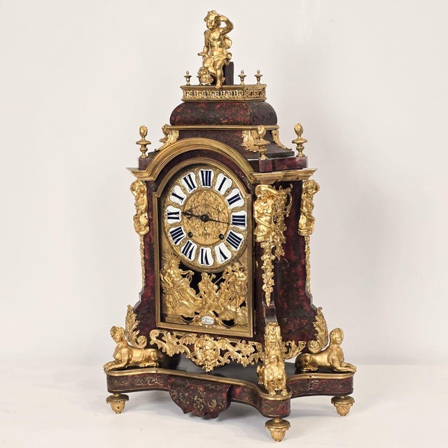 A Louis XIV Boulle and gilt bracket clock.