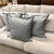 Design Plus Gallery presents a Set of Three Ticking Stripe Throw Pillows. The pillows have a light blue tone with very...