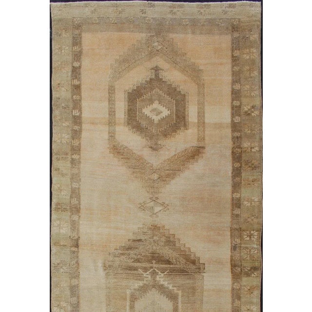 Vintage wide Gallery runner from Turkey with Geometric Medallion design in various tones earth colors such as of tan,...