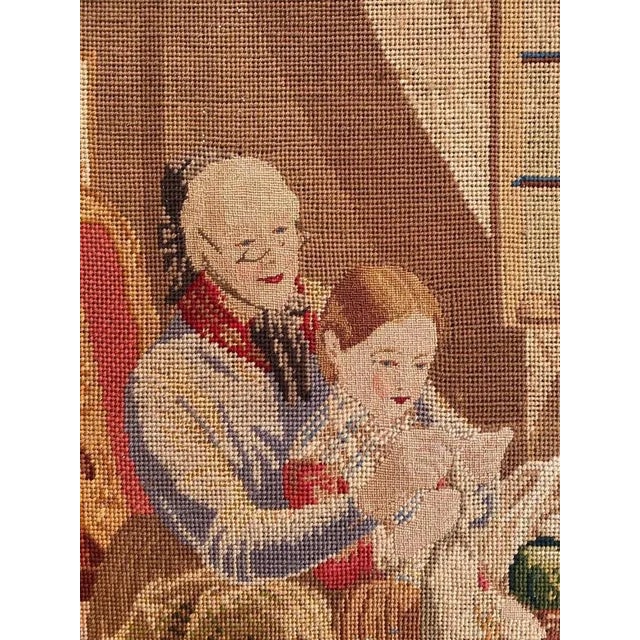 Very beautiful late 19th century needlepoint tapestry with beautiful design of a scene of an elderly lady teaching a young...