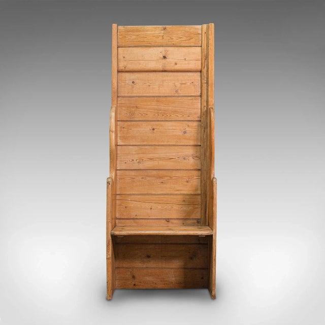 This is an antique provincial settle. An English, pine farmhouse seat, dating to the late Victorian period, circa 1900....