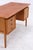 Vintage teak desk with clean lines and a beautiful, even grain. Three drawers are located on the left, and a lockable...