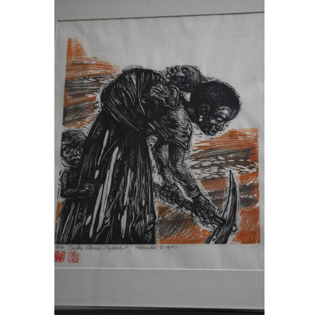 Beautiful and powerful woodcut done by Carlos Llerena Aguirre from 1981. Depicts a young mother with her infant child...