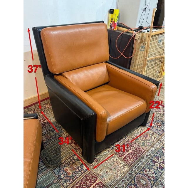 Being offered for sale is this Roche Bobois leather chair and matching ottoman. Both pieces are in very good condition....