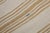 A mid-20th-century ivory and light brown Turkish Kilim striped runner