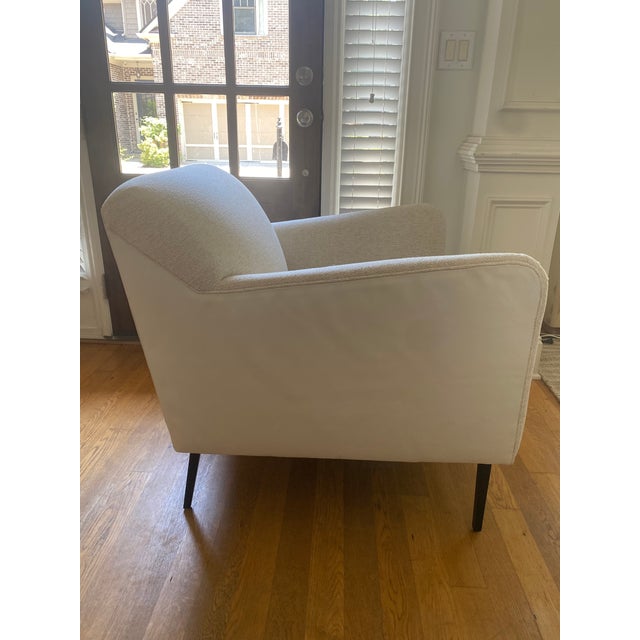 Room & Board Matteo lounge chair, ivory leather back with natural linen cushion.