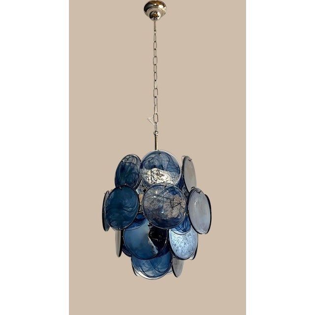 # Vintage Italian Murano Glass Chandelier in Vistosi Style – 24 Alabaster Blue Discs A striking vintage Italian Murano...