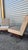 A refined pair of vintage armchairs in the Italian Midcentury Modern style, characterized by a clean, geometric silhouette...