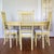 This 20th-century Thomasville oval dining table features faux bamboo legs with a faux bamboo trim around the apron. It...