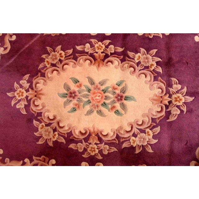 Floral rug with a central medallion. The warp and weft are made of cotton, the pile is made of wool. The rug is hand-...