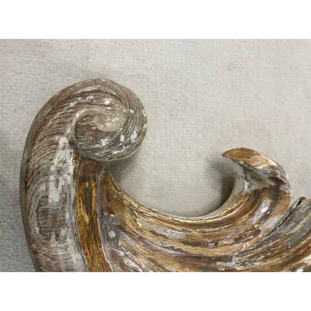 Wood sconce has decorated with carved acanthus leaves. The patina of time is superb, indeed the colors white, natural wood...