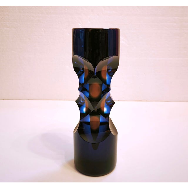 A striking and extremely heavy Czech studio art glass vase by Milan Macháček for Princ Glass, featuring a dark cobalt blue...