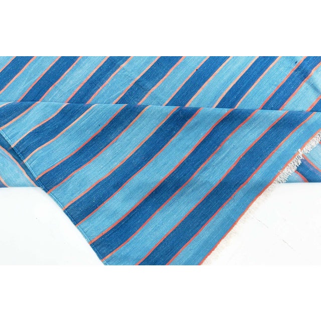 Vintage Indian Dhurrie striped blue rug Size: 15'5" × 16'8" (469 × 508 cm) The vintage Dhurrie before your eyes is simple...