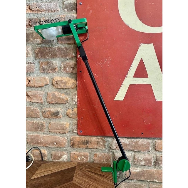 Vintage Sintesi Morsetto desk clamp lamp designed by Ernesto Gismondi for the Italian lighting manufacturer Artemide. It...