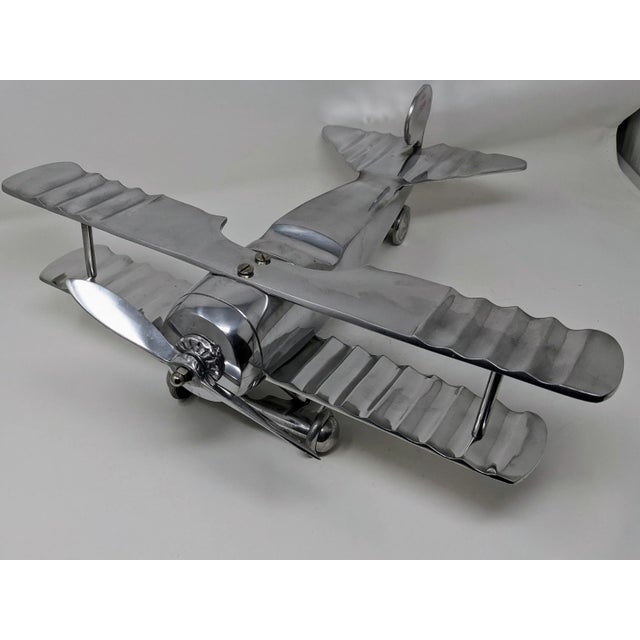 Mid-Century Modern Art Deco Inspired Model Aluminum Airplane With Articulated Landing Wheels & Propeller For Sale - Image 3 of 12