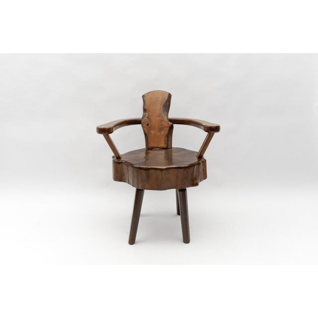 A total of four are available. Dark stained. Cool optic. Handmade imposing wooden armchair. Each armchair is unique. This...