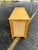 Beautiful bamboo and rattan sideboard/credeza. The front has a sunburst design with bamboo and glass windows in the doors....