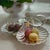 Effortlessly chic and rich in English heritage, this three-compartment silver plate shell tray by celebrated Birmingham...