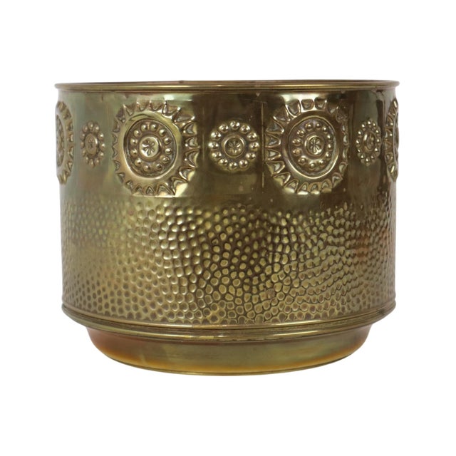 Large Art Nouveau-style brass planter, cache-pot, or jardinière featuring repoussé relief decoration; such items were also...