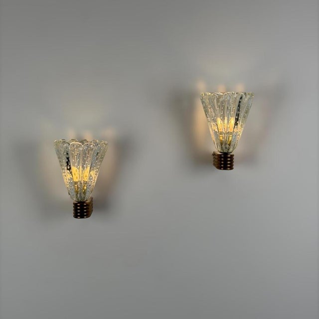 A rare and exceptionally sculptural pair of large-scale Murano glass wall sconces designed by Ercole Barovier for Barovier...