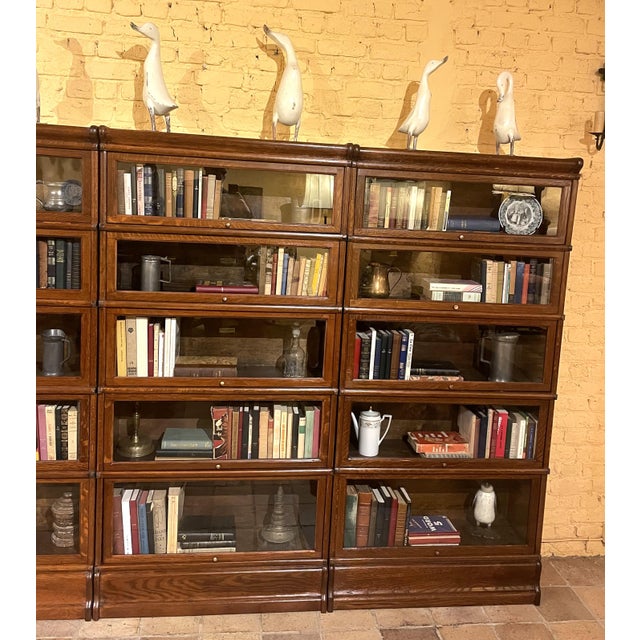 Exceptional set of four Globe Wernicke London oak bookcases from the late 19th/early 20th century - England. They can be...