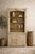 This lovely cabinet is impressive st 95 inches in height. It is most likely Italian and has rustic French styling with a...