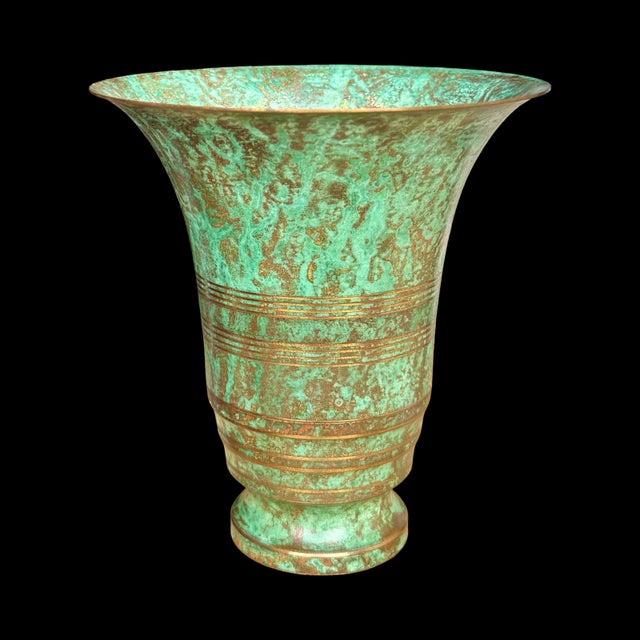 A vintage Art Deco bronze vase by Carl Sorensen, a Danish-American metalsmith known for his patinated bronze work in the...