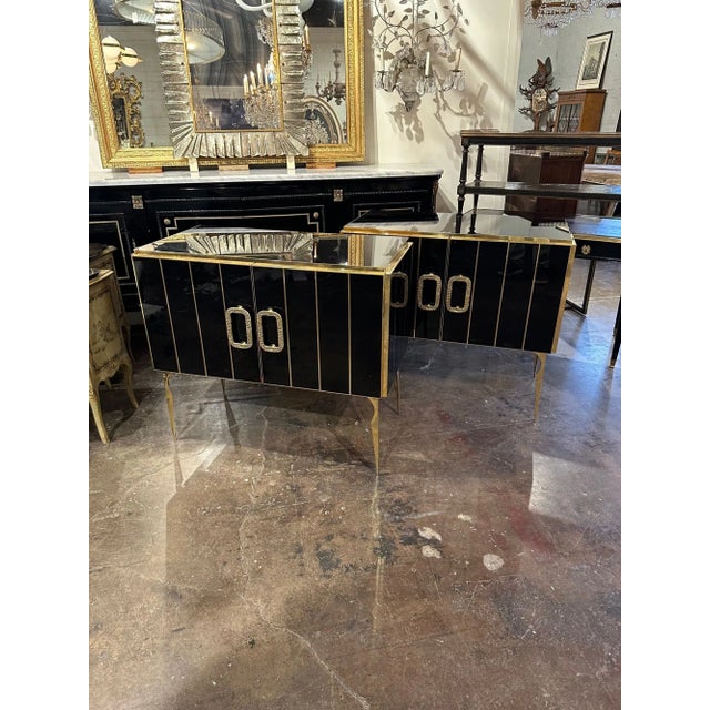 Fabulous Modern Murano black glass and brass side cabinet. Circa 2000. A favorite of top designers! Note: these are sold...