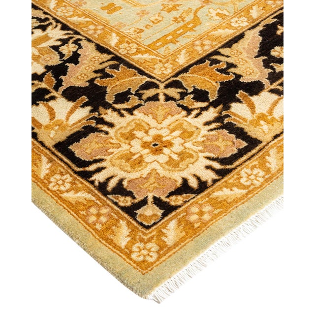 Persian rug-making at its finest inspired the rich colors, elaborate geometric motifs, and botanical detailing of the...