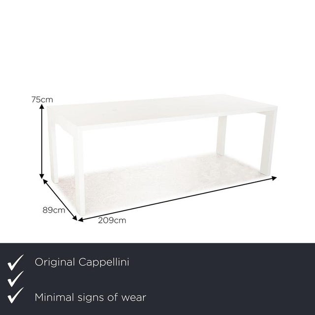 The Gamma dining table by Cappellini is made of white wood and impresses with its stylish look. It is characterized by its...