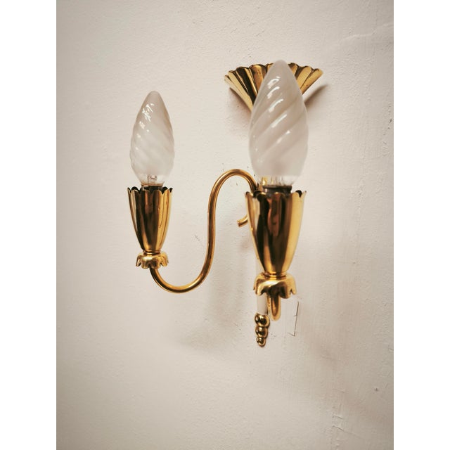 Brass Double-Light Wall Lamp, 1950s, in Very Good conditions. Designed 1950 to 1959 Up to 250V (Europe/UK Standard).The...
