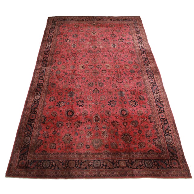 Hand knotted wool Turkish Sparta rug with floral design.
