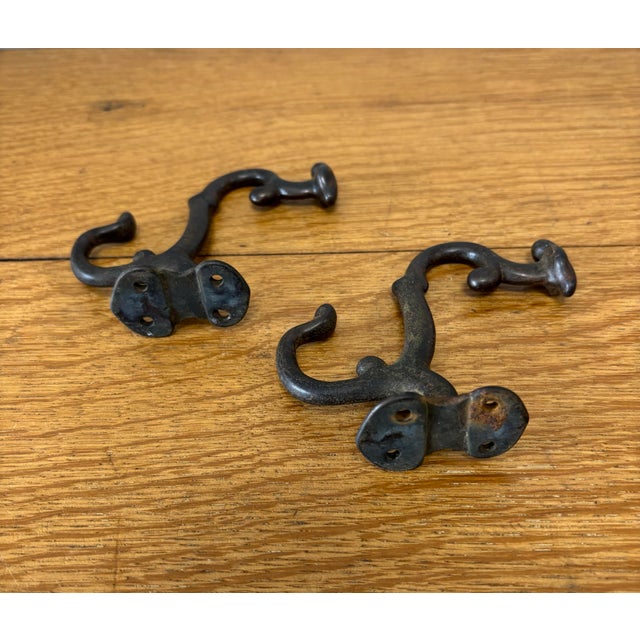 Early 20th Century Antique Cast Metal Wall Mount Hat and Coat Hooks - A Pair For Sale - Image 5 of 6
