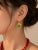 Traditional Late 20th Century Pair of 14K Yellow Gold Diamond Sapphire Fishes Earrings For Sale - Image 3 of 3