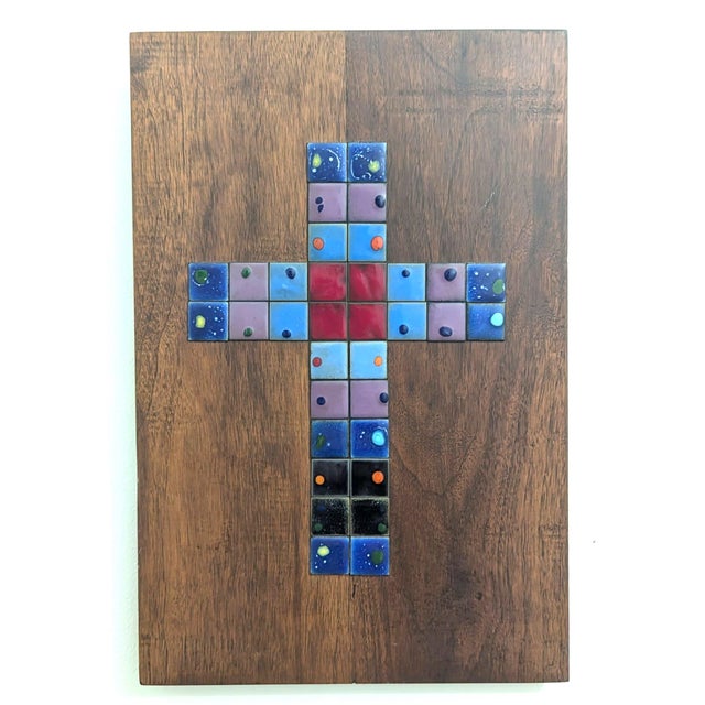 Offered is a mid 20th Century cross composed of mosaic tile adhered on stained wood. It bears no signature or label and...