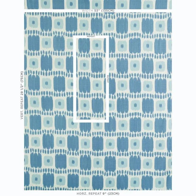 Kandira features a graphic pattern derived from woven ikats. A painterly checkerboard design with tonal variations and a...