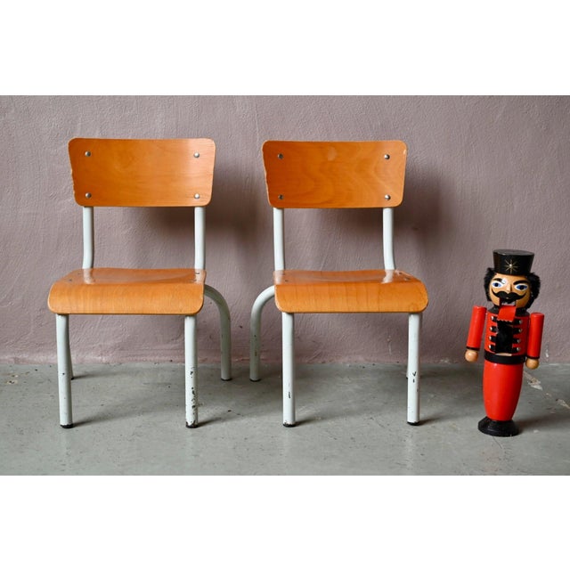 These two little school chairs have seen their fair share of toddlers! Typical of 1960s nursery schools, the chairs have a...
